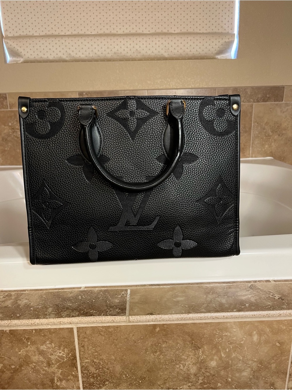 Authentic Louis Vuitton Black On The Go Embossed Monogram Tote